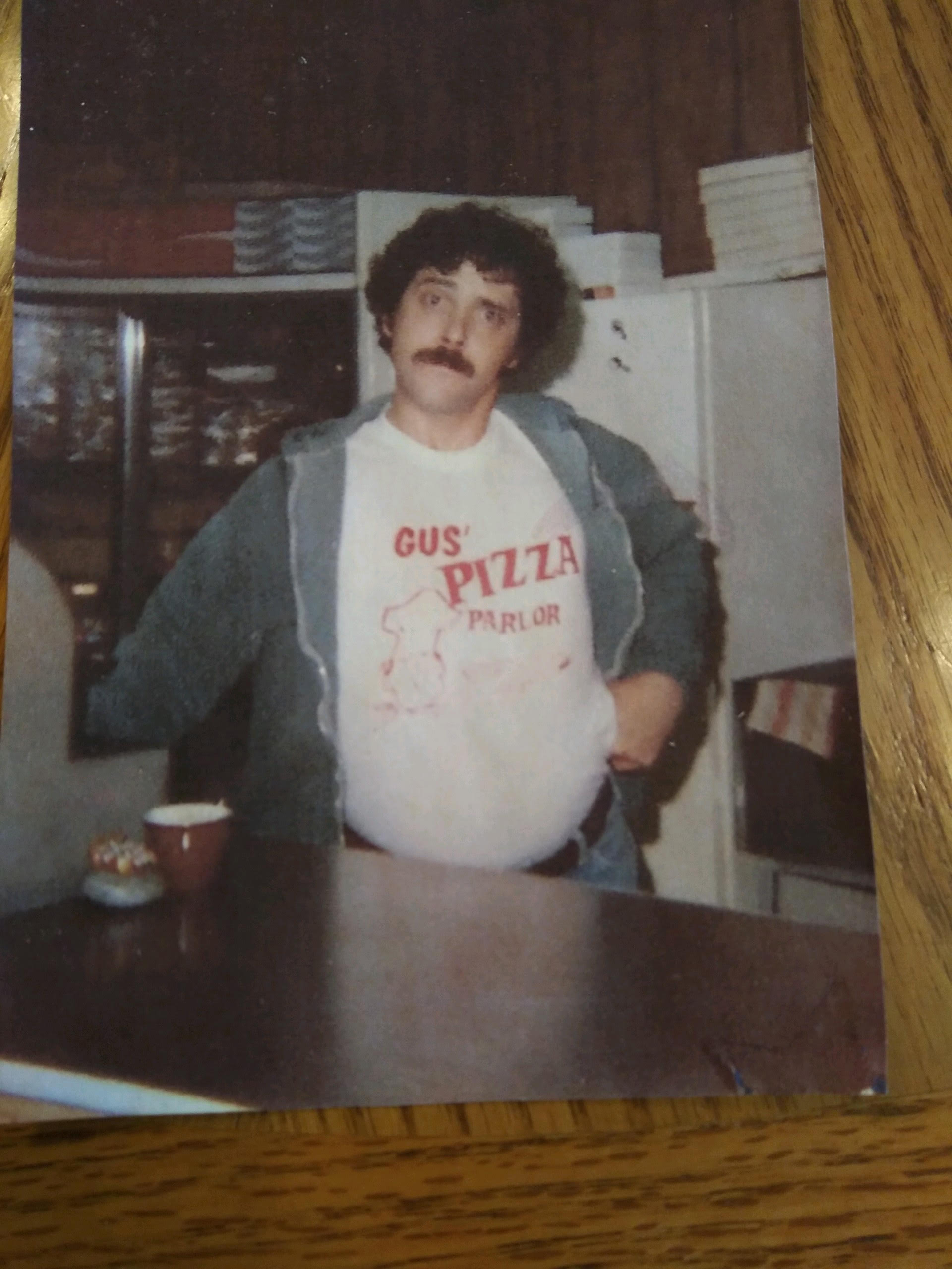 Ben’s father working at Gus’ Pizza Parlor
